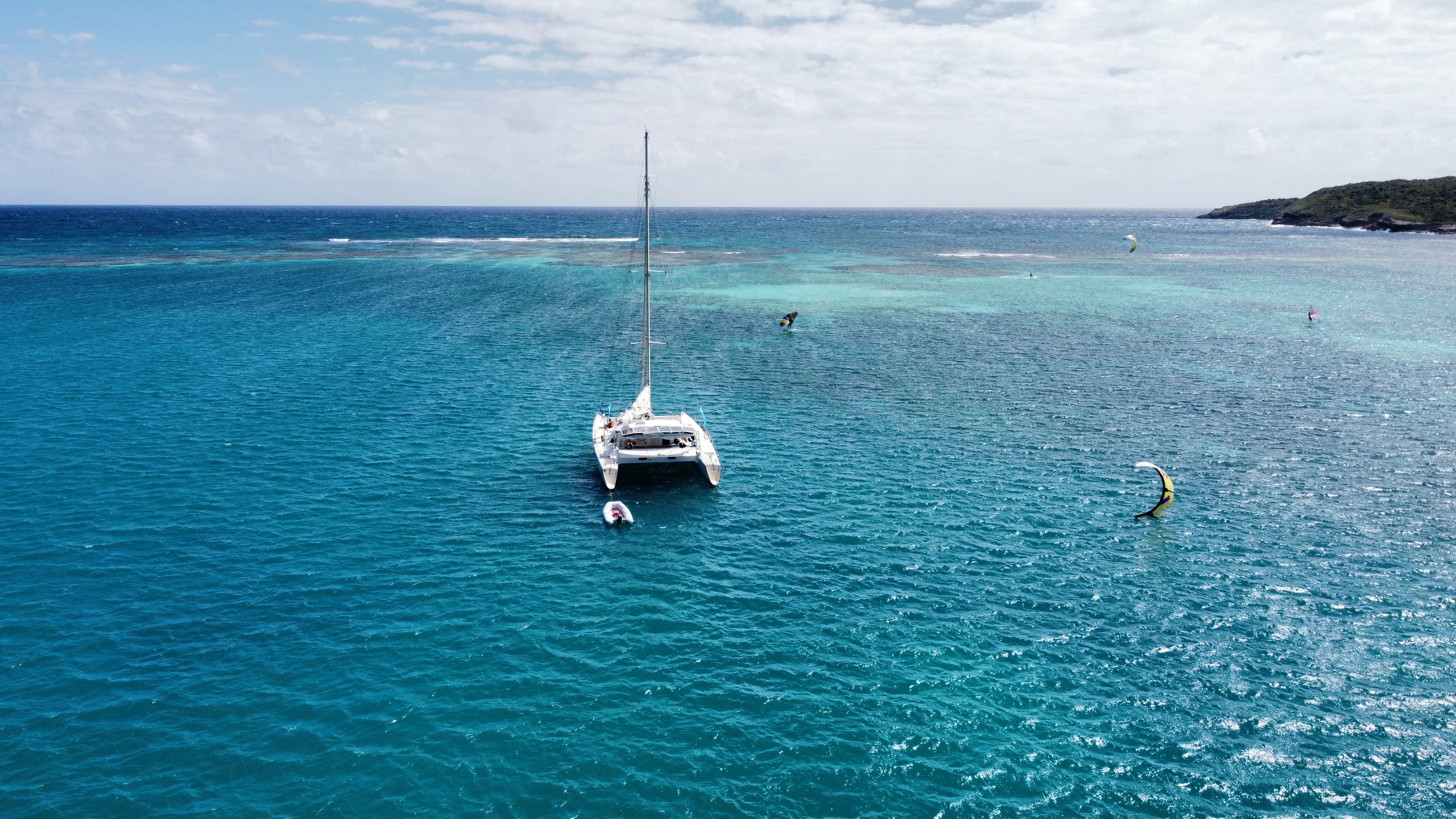 Caribbean sunset kiteboarding at Barbuda pink beaches